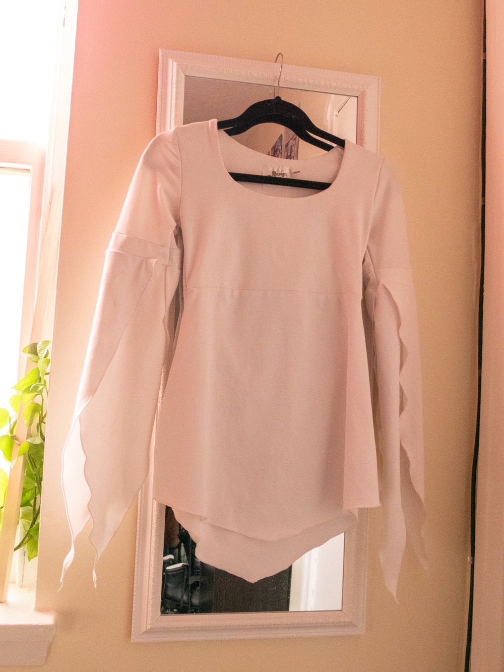 Women’s White Long-Sleeve Asymmetric Flutter Top